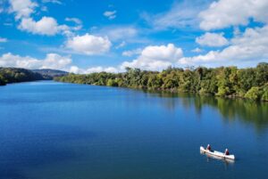 Lone kayak paddling down one of the best texas lakes