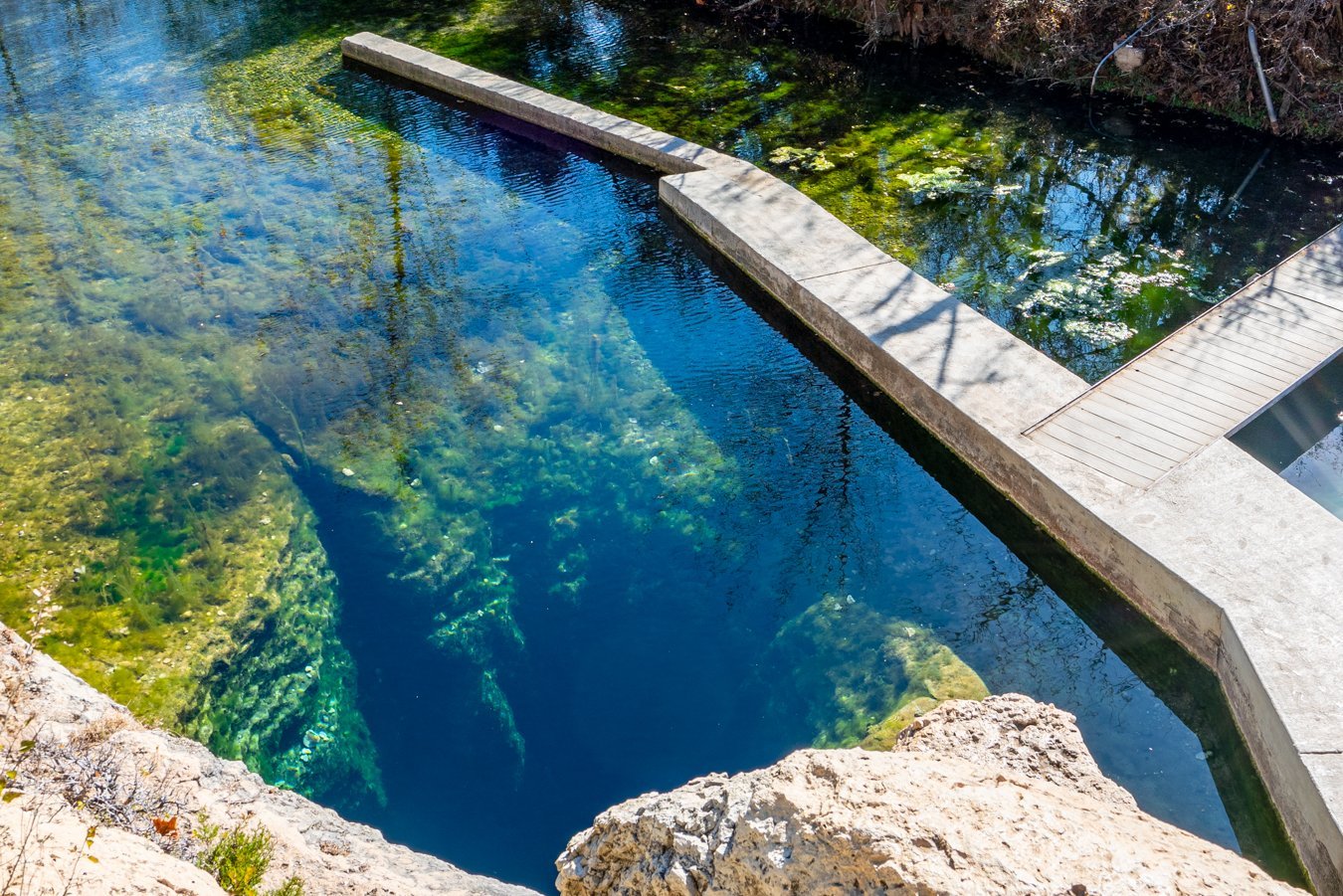 jacobs well texas as seen from above on a sunny day