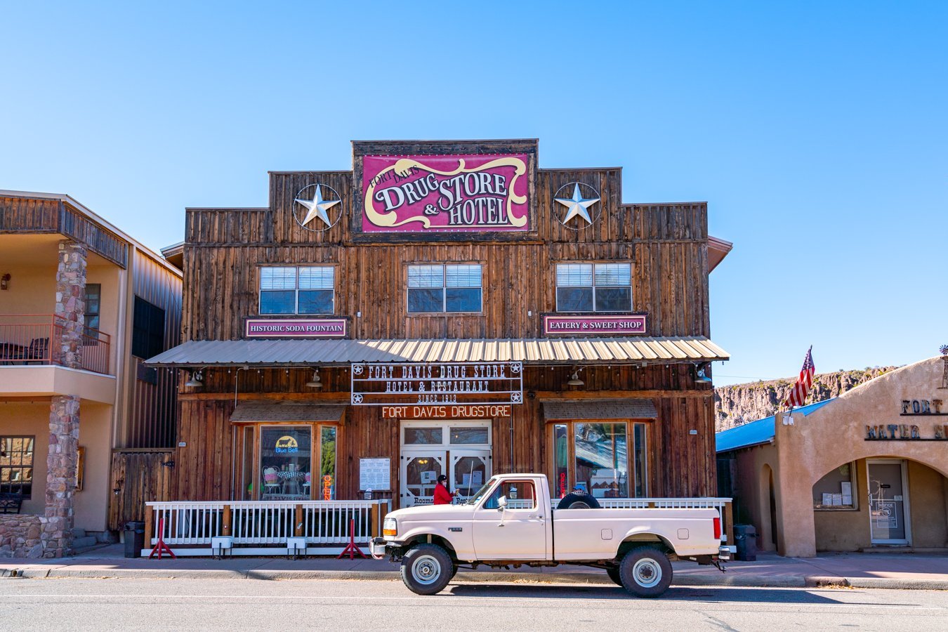 fort davis drugstore with pickup truck out front, one of the best things to do in fort davis tx