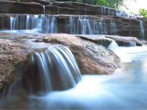 close up of airfield waterfalls fort worth, one of the best waterfalls near dallas texas