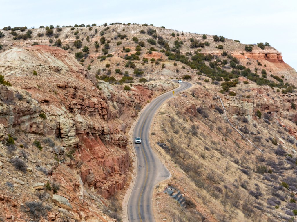 aerial view of scenic road in palo duro canyon, one of the best day trips from amarillo tx